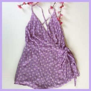 Floral romper with mock wrap skirt size medium